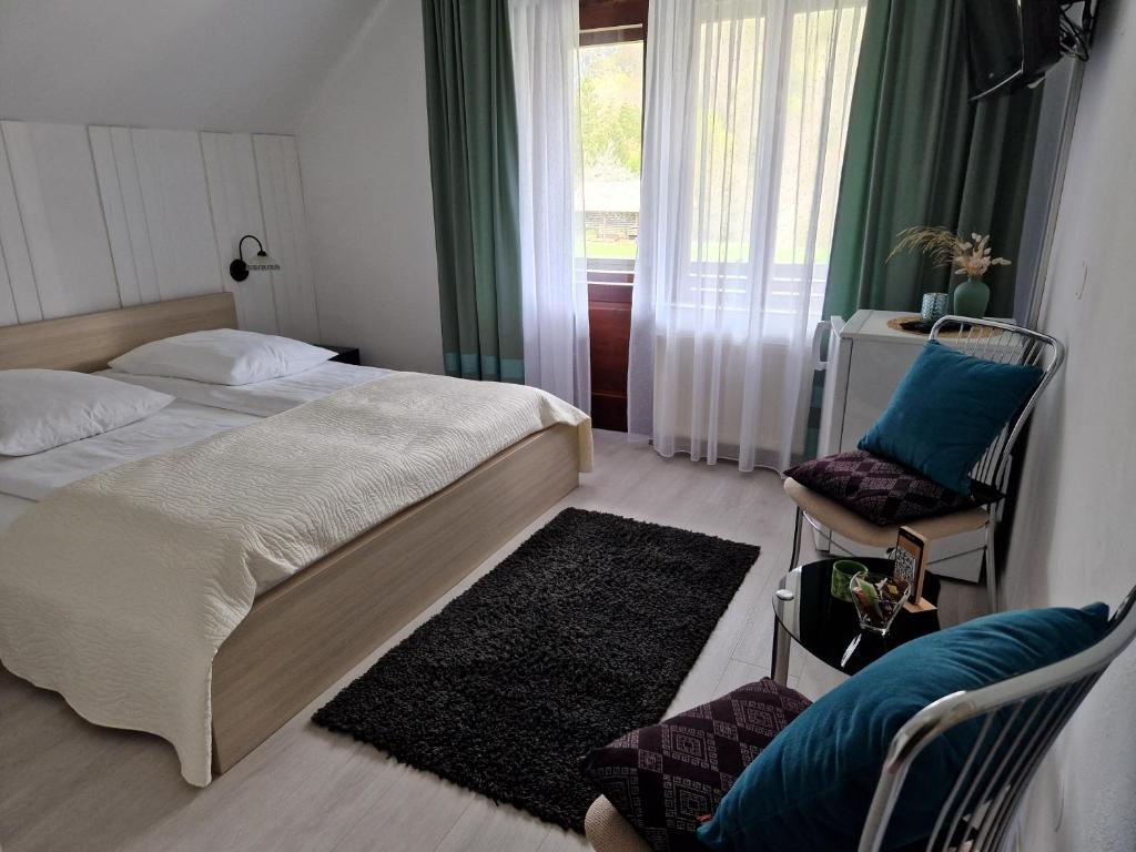 Postel nebo postele na pokoji v ubytování Sobe Ćuskić