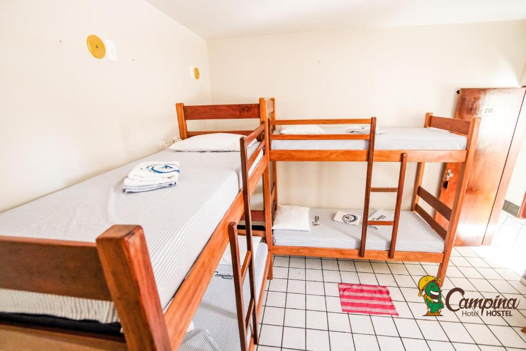 a bedroom with two bunk beds in a room at Loft 88 - Campina Hostel in Campina Grande