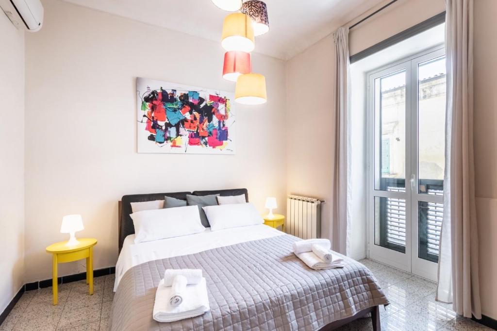 Postel nebo postele na pokoji v ubytování Guest House Aurispa
