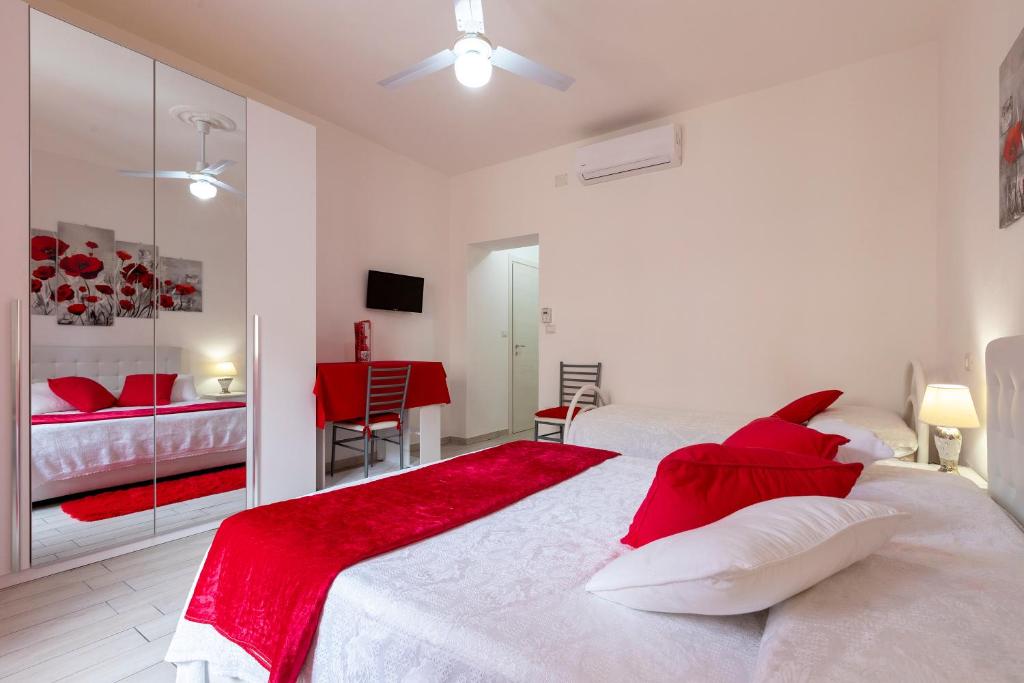 Postel nebo postele na pokoji v ubytování Jadianas Guest House