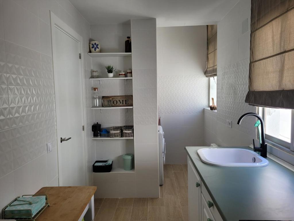 A kitchen or kitchenette at Piso Stylety Alcazar