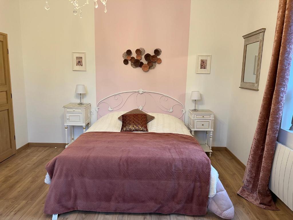 Postel nebo postele na pokoji v ubytování Château Ségot