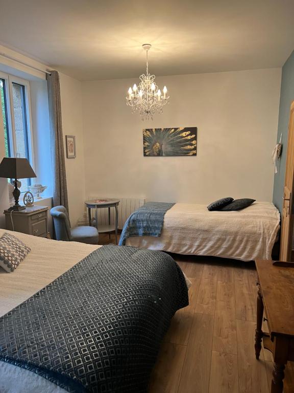 Postel nebo postele na pokoji v ubytování Château Ségot