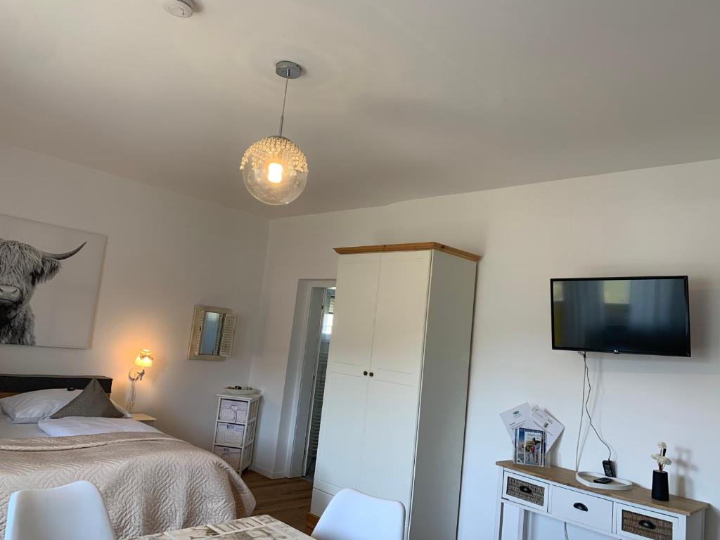 Łóżko lub łóżka w pokoju w obiekcie Warmbad Apartments