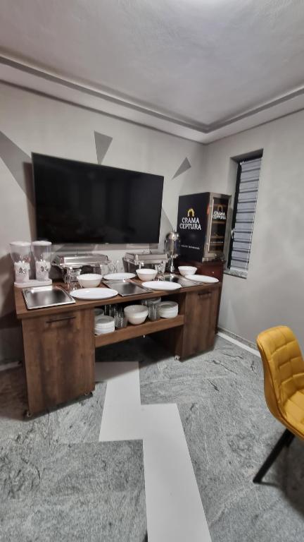 TV a/nebo společenská místnost v ubytování Vila Bun