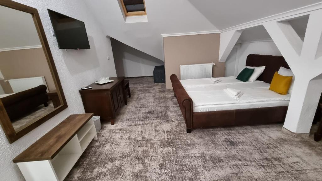 Postel nebo postele na pokoji v ubytování Vila Bun