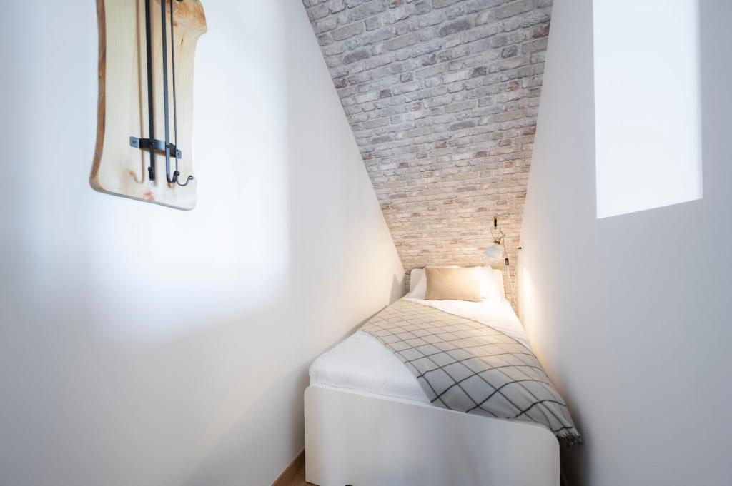 Postel nebo postele na pokoji v ubytování GrosAlp apartments