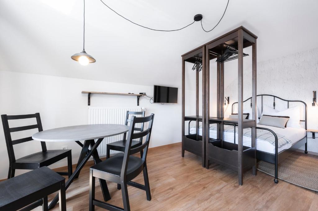 Postel nebo postele na pokoji v ubytování GrosAlp apartments