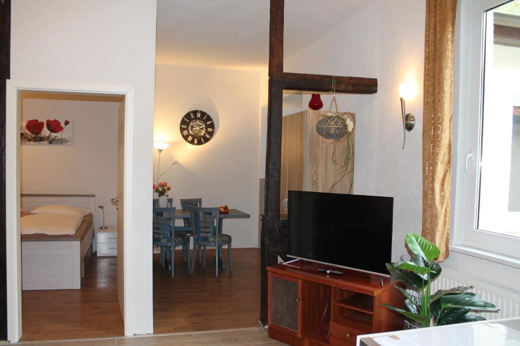TV a/nebo společenská místnost v ubytování Murphy's Zimmer und Apartments
