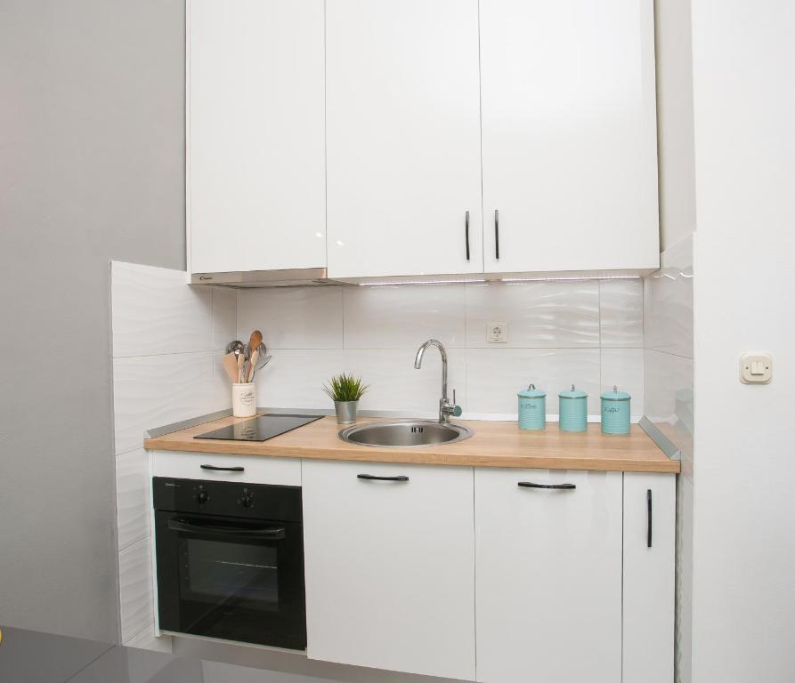 Kuchyň nebo kuchyňský kout v ubytování Apartment Vallissurda