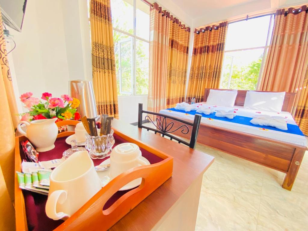 Postel nebo postele na pokoji v ubytování Ima Villa Sigiriya