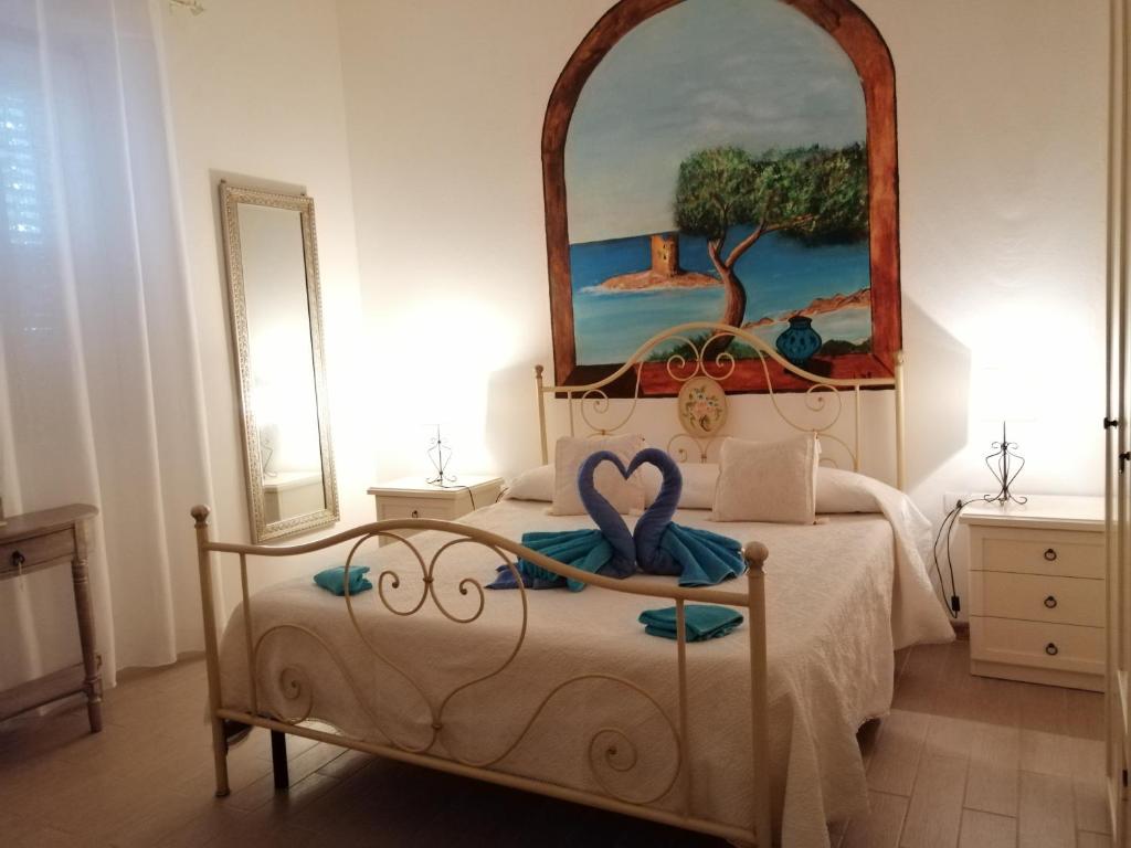 Katil atau katil-katil dalam bilik di La Porta Sulla Costa
