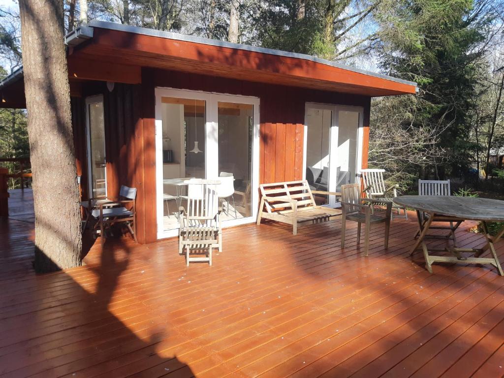 Balkón nebo terasa v ubytování Guest house in the Forest
