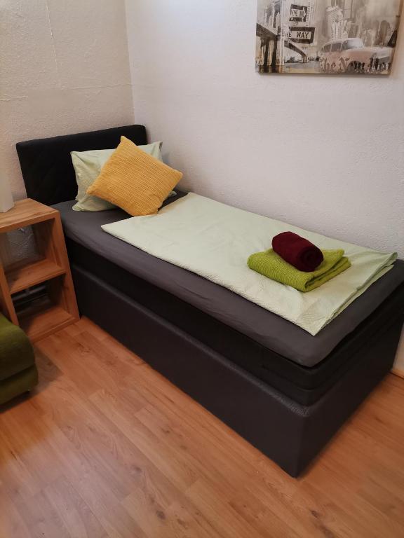 Uma cama ou camas num quarto em Pension Prem