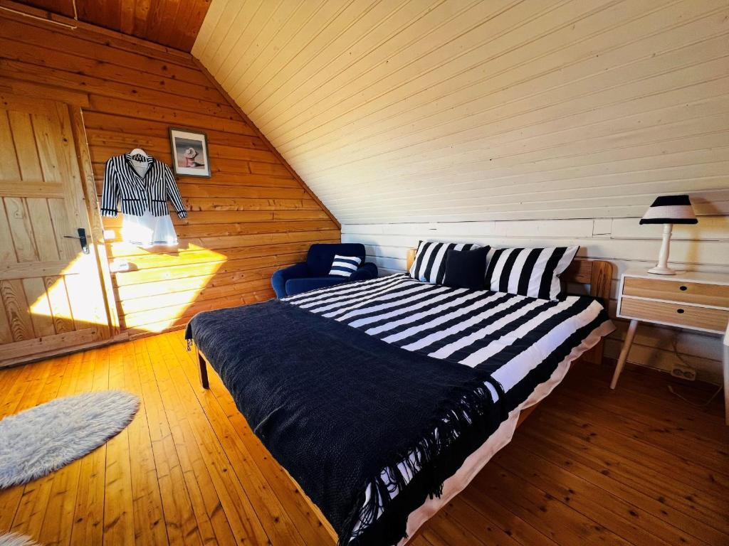 Postel nebo postele na pokoji v ubytování Merejussi Puhkemajad