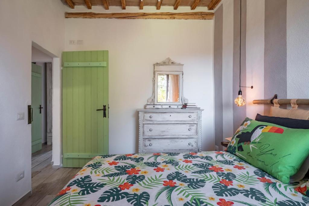 Łóżko lub łóżka w pokoju w obiekcie Residenza Castello di Valli