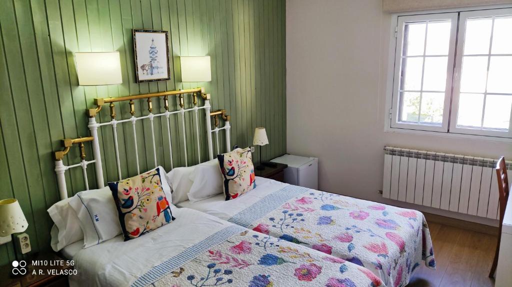 Postel nebo postele na pokoji v ubytování Hostal Martin - Sanabria