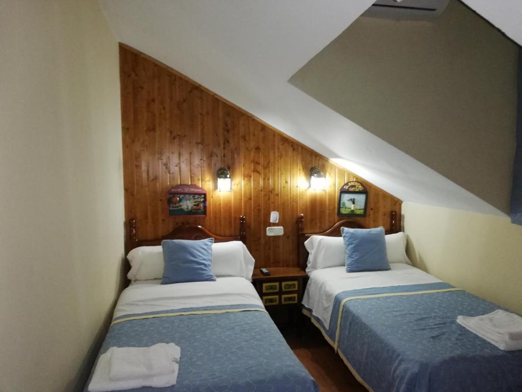Postel nebo postele na pokoji v ubytování Hostal Martin - Sanabria