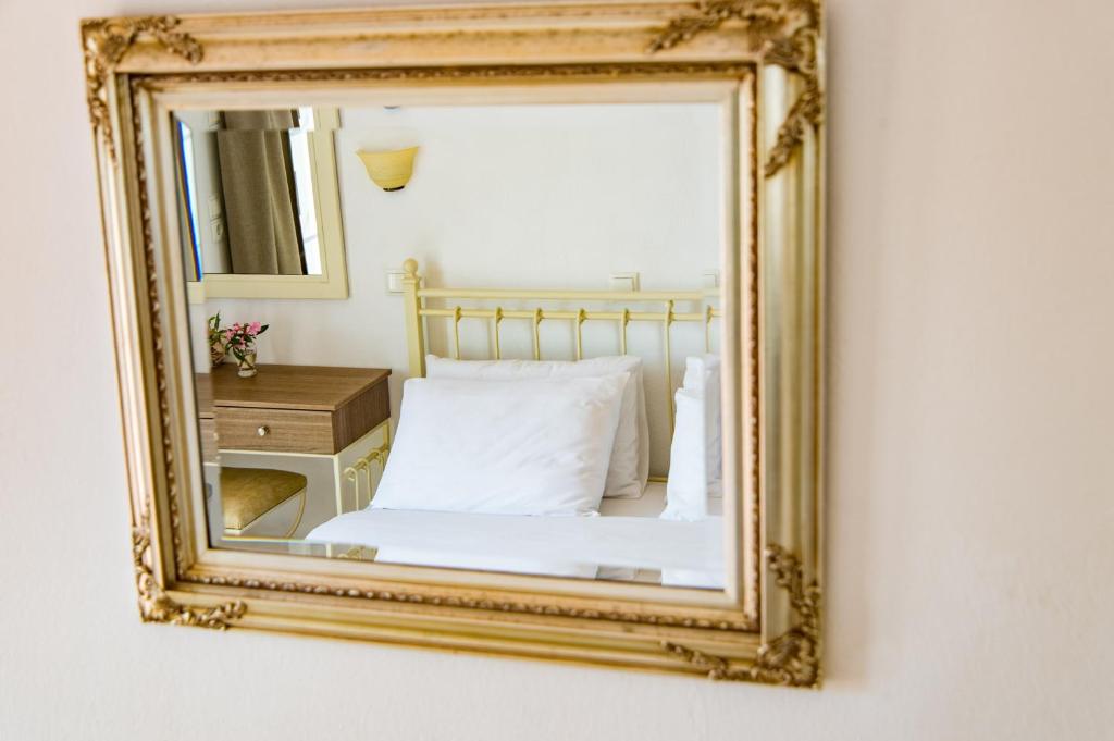 Postel nebo postele na pokoji v ubytování Joanna Apart - Hotel