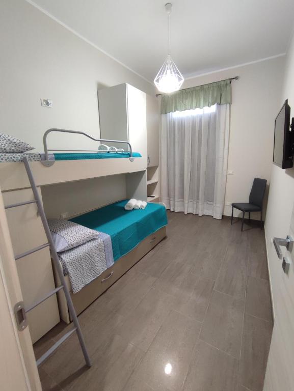 Posteľ alebo postele v izbe v ubytovaní Casa Violetta