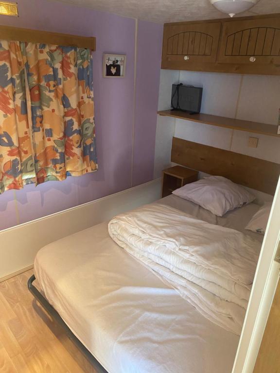 Postel nebo postele na pokoji v ubytování Mobilhome bordure de mer