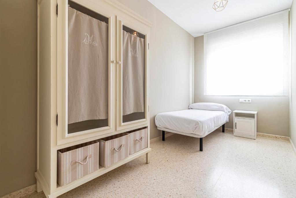 Postel nebo postele na pokoji v ubytování Allo Apartments Europa I Parking Piscina Padel 3 Habitaciones