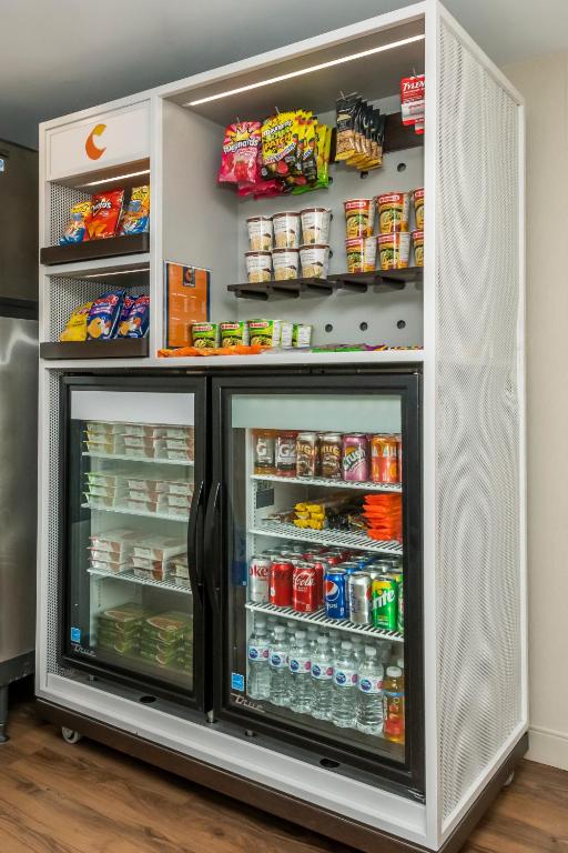 a refrigerator filled with lots of food and drinks at Comfort Inn in Ottawa