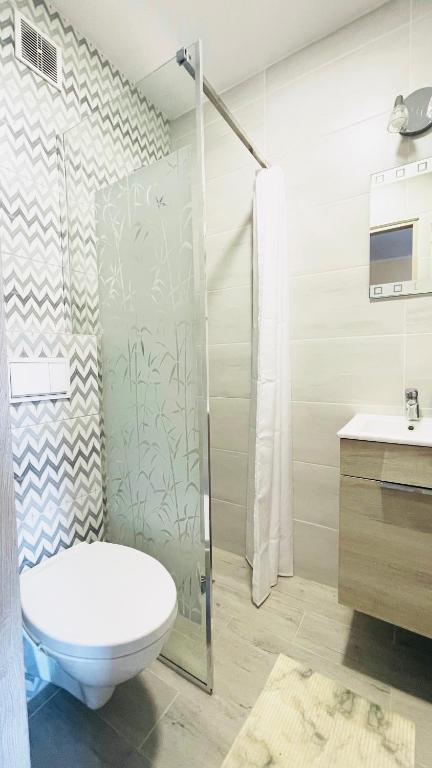 Kúpeľňa v ubytovaní Apartament Kościuszko