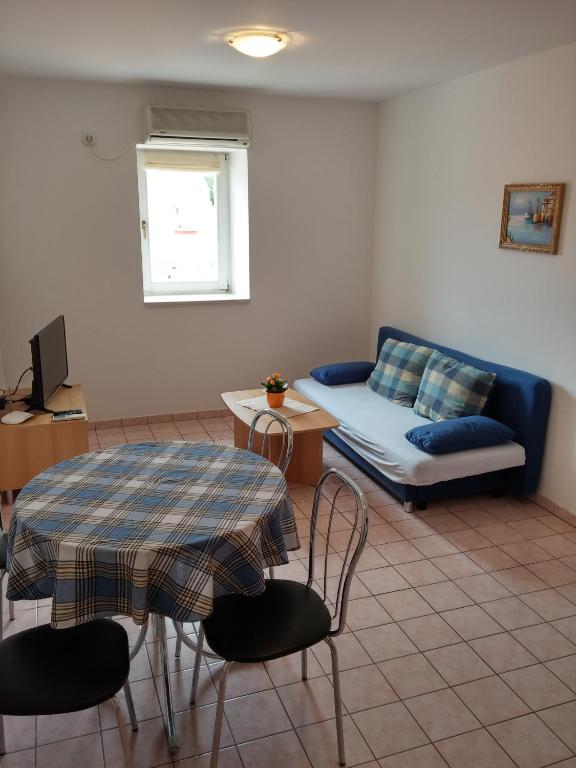 Posedenie v ubytovaní Apartments Bellus Mare