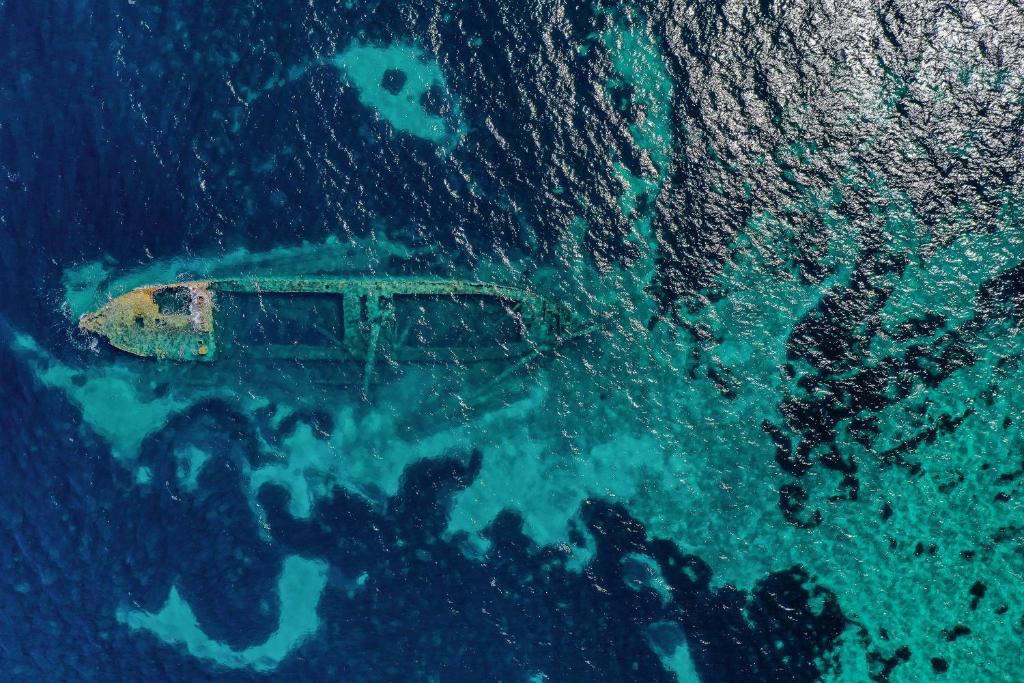 an aerial view of a boat in the water at Apartments Marta in Verunić