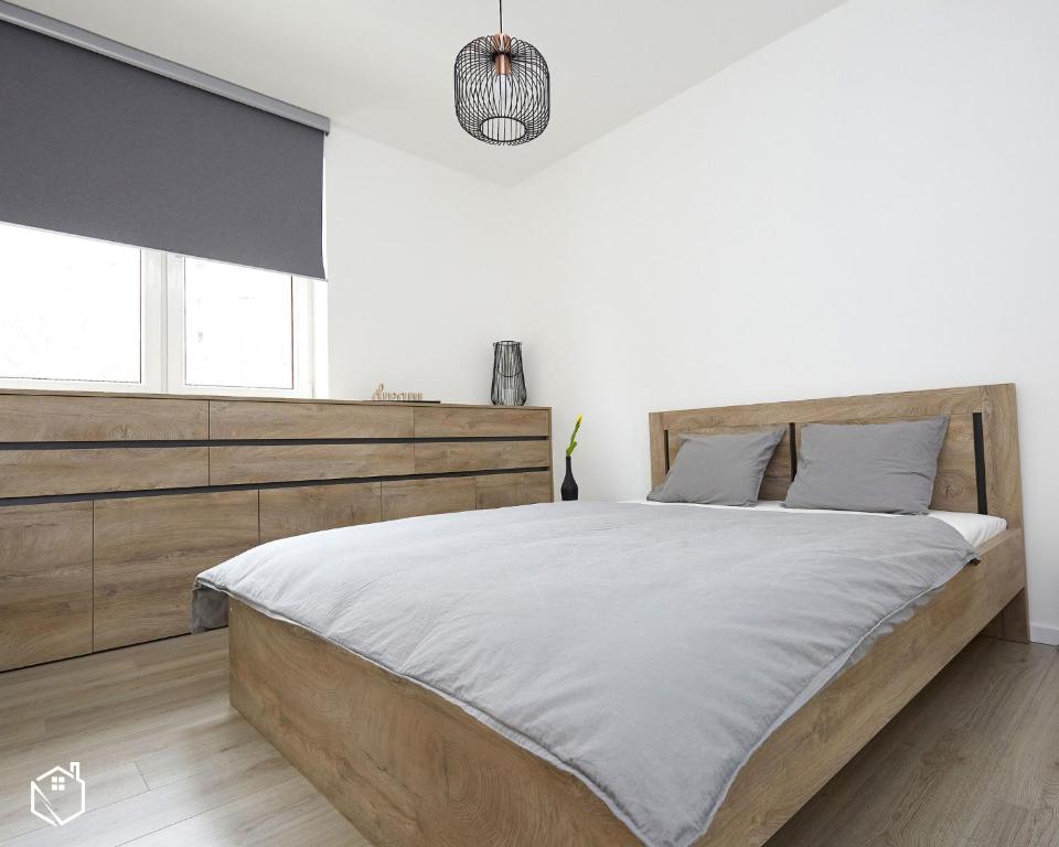 Postel nebo postele na pokoji v ubytování Well Done Apartment Bratislava