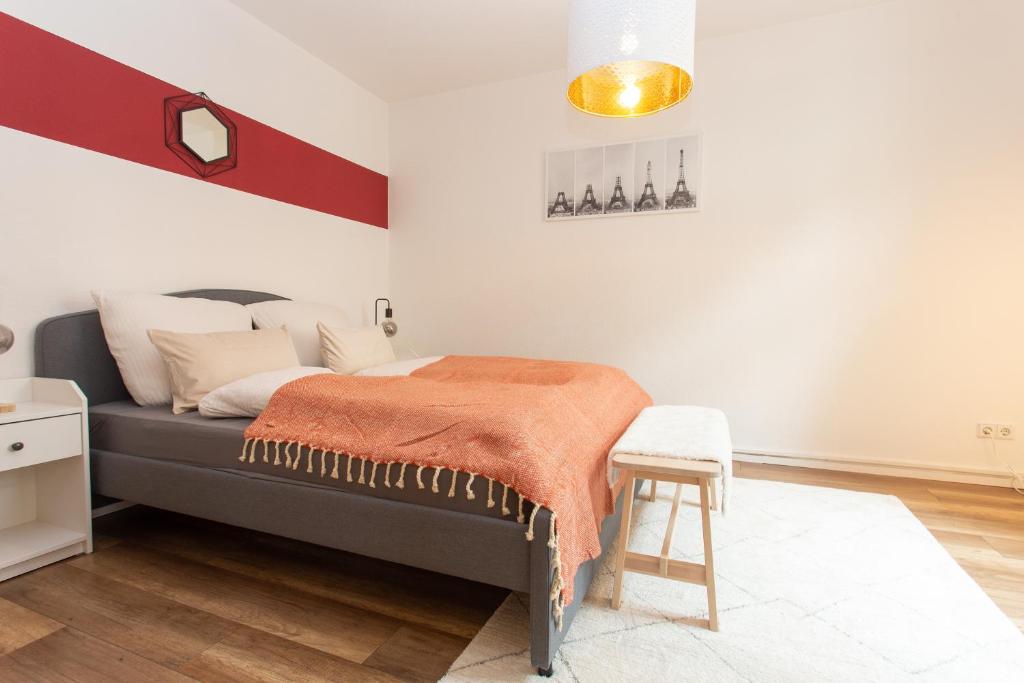 מיטה או מיטות בחדר ב-FULL HOUSE Studios - Little Paris Apartment - Nespresso + WiFi inkl.