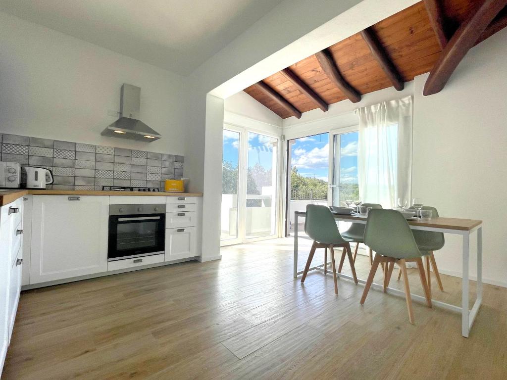 A kitchen or kitchenette at Naked House Sardinia