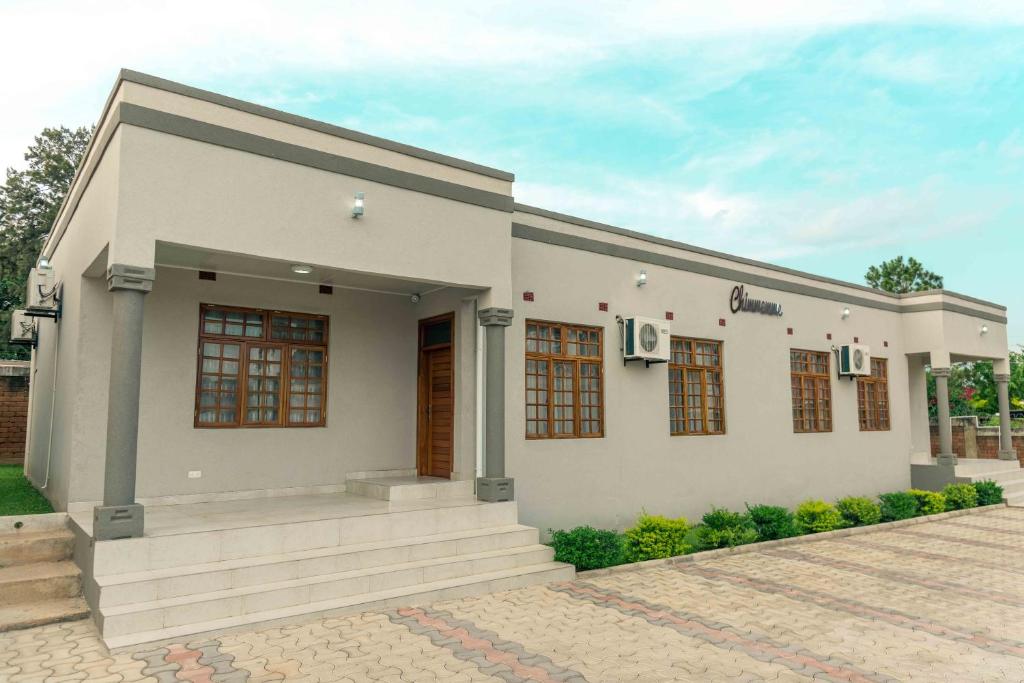 a rendering of a small white house at Luxurious Chimwemwe II - Kat-Onga Apartments in Lusaka