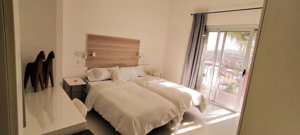 Postel nebo postele na pokoji v ubytování Villa con piscina privada Palmeras Home
