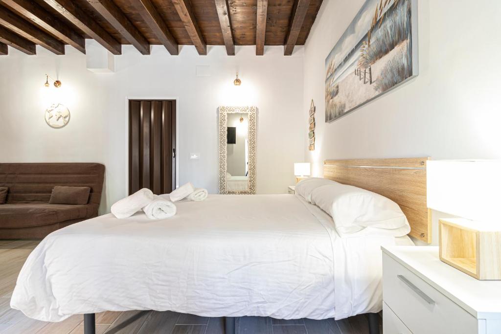 Posteľ alebo postele v izbe v ubytovaní Allo Apartments Plateros Centro Jacuzzi Comunitario