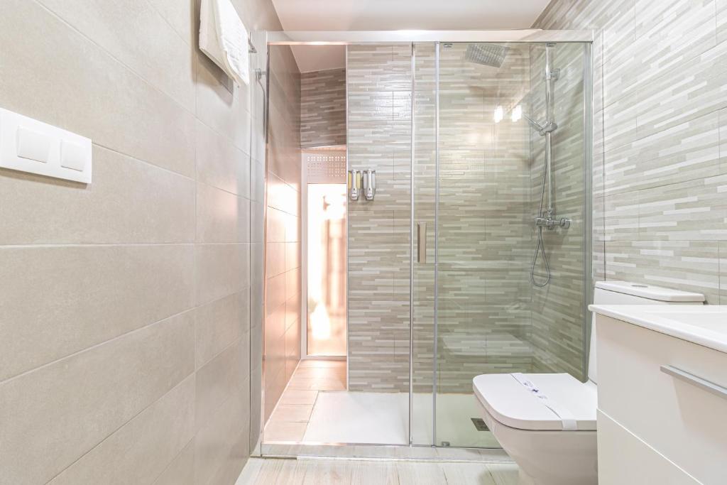 Kúpeľňa v ubytovaní Allo Apartments Plateros Centro Jacuzzi Comunitario