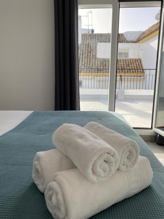 Postel nebo postele na pokoji v ubytování Villamarta Boutique Rooms