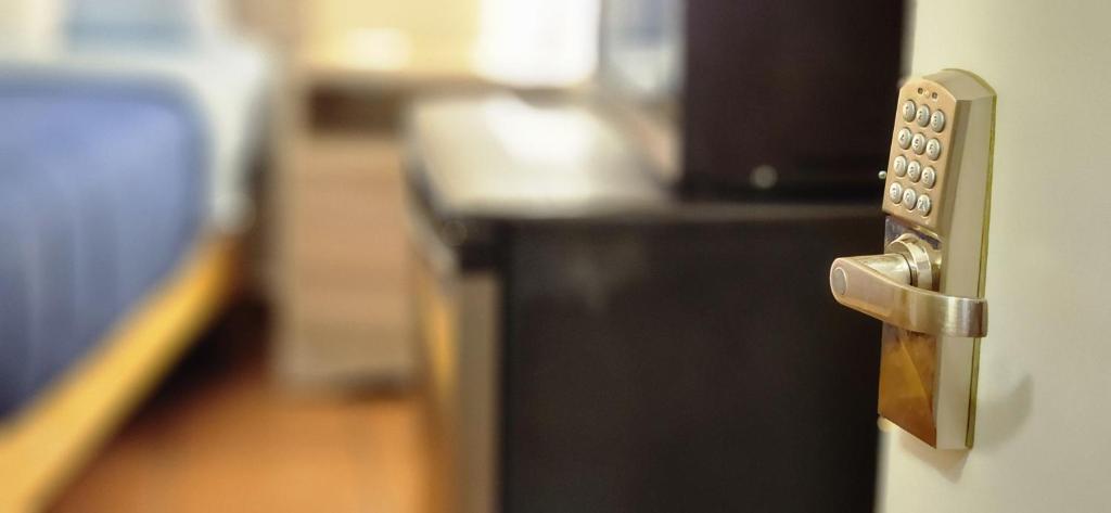 Postel nebo postele na pokoji v ubytování Hospedaje GGG