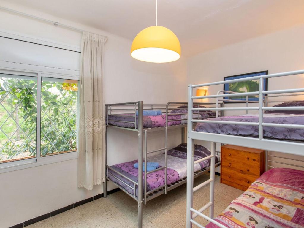 A bed or beds in a room at Apartment Cambre d'Aze by Interhome