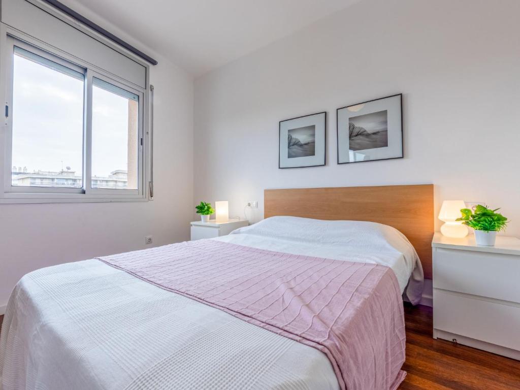 A bed or beds in a room at Apartment Terecel Salou-14 by Interhome