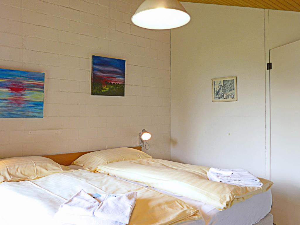 Postel nebo postele na pokoji v ubytování Apartment Im Gruebi Apt- 10 by Interhome