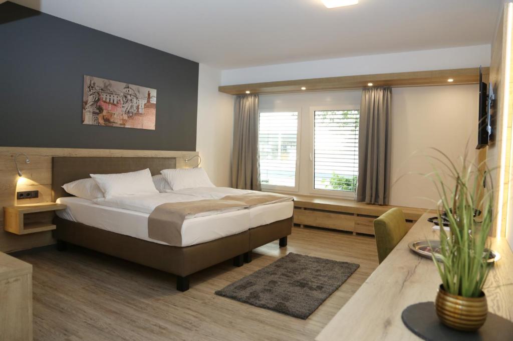 Postel nebo postele na pokoji v ubytování Hotel Lindleinsmühle