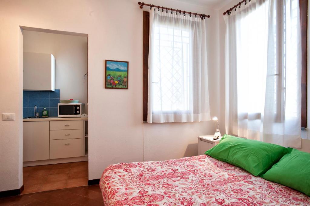 Postel nebo postele na pokoji v ubytování Casa Vacanze Tana della Volpe