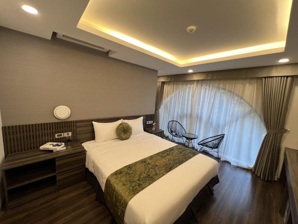 Postel nebo postele na pokoji v ubytování 3T Hotel Hanoi