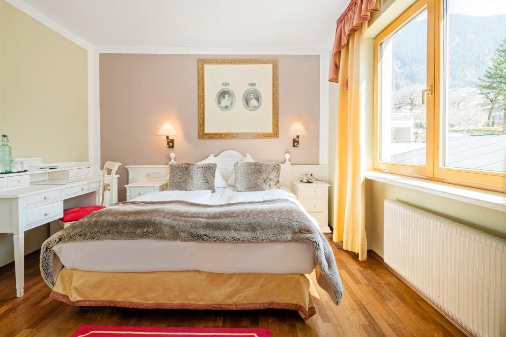 Postel nebo postele na pokoji v ubytování Hotel Gasthof Adler