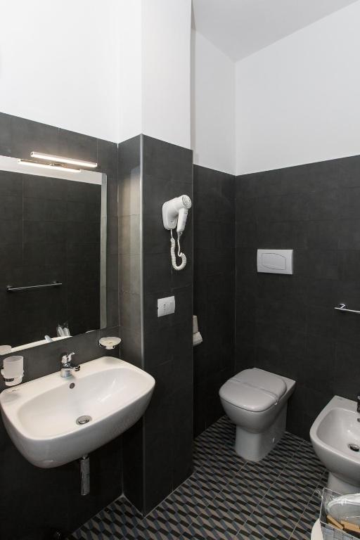 Koupelna v ubytování Malù Suites