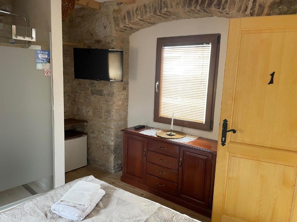 TV a/nebo společenská místnost v ubytování Castle Inn