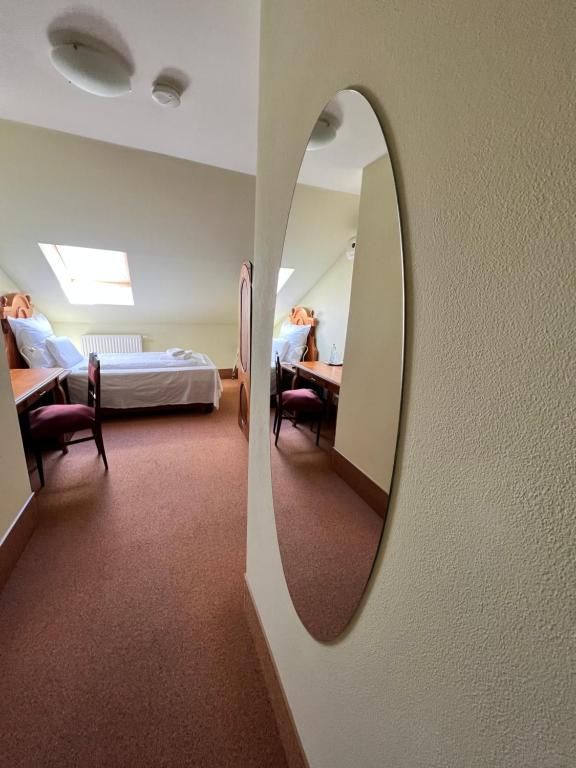 Postel nebo postele na pokoji v ubytování Hotel Maxi