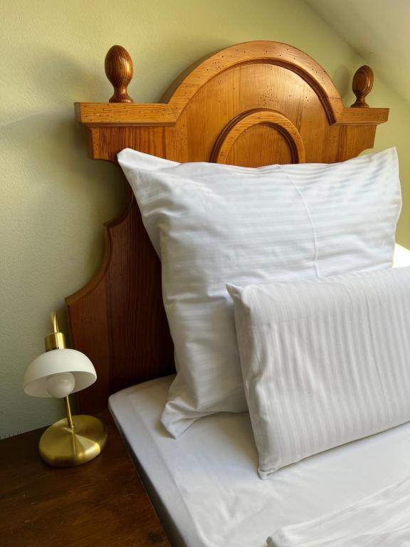Postel nebo postele na pokoji v ubytování Hotel Maxi